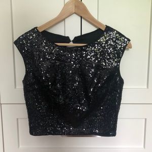 cropped, sequins, high neck Chelsea top.
